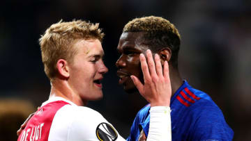 STOCKHOLM, SWEDEN - MAY 24: Matthijs de Ligt of Ajax chats with Paul Pogba of Manchester United during the UEFA Europa League Final match between Ajax and Manchester United at Friends Arena on May 24, 2017 in Stockholm, Sweden. (Photo by Chris Brunskill Ltd/Getty Images)