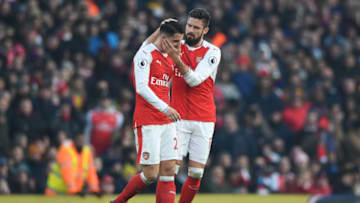 LONDON, ENGLAND - JANUARY 22: Granit Xhaka (L) of Arsenal is consoled by his team mate Olivier Giroud (R) after being shown a red card during the Premier League match between Arsenal and Burnley at the Emirates Stadium on January 22, 2017 in London, England. (Photo by Shaun Botterill/Getty Images)
