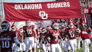 NORMAN, OK - AUGUST 30: The Oklahoma Sooners take the field before the game against the Louisiana Tech Bulldogs August 30, 2014 at Gaylord Family-Oklahoma Memorial Stadium in Norman, Oklahoma. The Sooners defeated the Bulldogs 48-16. (Photo by Brett Deering/Getty Images)