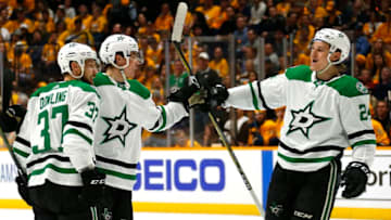 NASHVILLE, TENNESSEE - APRIL 10: Roope Hintz #24 and Justin Dowling #37 of the Dallas Stars congratulate teammate Miro Heiskanen #4 on scoring a goal against the Nashville Predators during the second period in Game One of the Western Conference First Round during the 2019 NHL Stanley Cup Playoffs at Bridgestone Arena on April 10, 2019 in Nashville, Tennessee. (Photo by Frederick Breedon/Getty Images)