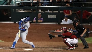 PHOENIX, ARIZONA - SEPTEMBER 01: Joc Pederson #31 of the Los Angeles Dodgers hits a solo home run against the Arizona Diamondbacks during the 11th inning of the MLB game at Chase Field on September 01, 2019 in Phoenix, Arizona. (Photo by Christian Petersen/Getty Images)