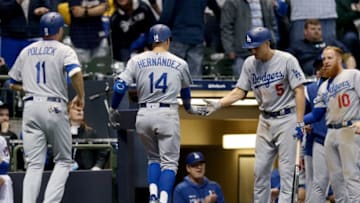MILWAUKEE, WISCONSIN - APRIL 19: Enrique Hernandez #14 and Corey Seager #5 of the Los Angeles Dodgers celebrate after Hernandez hit a home run in the eighth inning against the Milwaukee Brewers at Miller Park on April 19, 2019 in Milwaukee, Wisconsin. (Photo by Dylan Buell/Getty Images)
