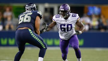 SEATTLE, WA - AUGUST 18: Defensive end Ifeadi Odenigbo #60 of the Minnesota Vikings battles tackle Darrell Brown #66 of the Seattle Seahawks at CenturyLink Field on August 18, 2017 in Seattle, Washington. (Photo by Otto Greule Jr/Getty Images)