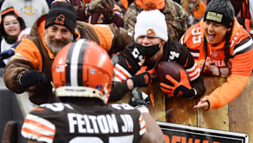 Jan 9, 2022; Cleveland, Ohio, USA; Fans react after Cleveland Browns running back Demetric Felton (25) gave fans a ball after scoring a touchdown during the second half against the Cincinnati Bengals at FirstEnergy Stadium. Mandatory Credit: Ken Blaze-USA TODAY Sports