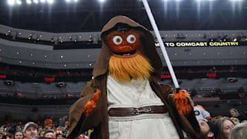 Nov 20, 2021; Philadelphia, Pennsylvania, USA; Philadelphia Flyers mascot Gritty dressed as Star Wars character Obi-Wan Kenobi against the Boston Bruins during the first period at Wells Fargo Center. Mandatory Credit: Eric Hartline-USA TODAY Sports