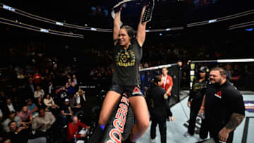 EDMONTON, AB - SEPTEMBER 09: Amanda Nunes of Brazil celebrates her victory over Valentina Shevchenko of Kyrgyzstan in their women's bantamweight bout during the UFC 215 event inside the Rogers Place on September 9, 2017 in Edmonton, Alberta, Canada. (Photo by Jeff Bottari/Zuffa LLC/Zuffa LLC via Getty Images)