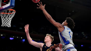 Duke basketball freshman Vernon Carey Jr. #1 takes a shot as Lars Thiemann #21 of the California Golden Bears guards him during the second half of their game at Madison Square Garden on November 21, 2019 in New York City. (Photo by Emilee Chinn/Getty Images)