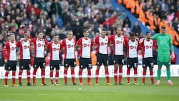 BRIGHTON, ENGLAND - OCTOBER 29: Southampton players line up for a minute's silence ahead of Remembrance Sunday prior to the Premier League match between Brighton and Hove Albion and Southampton at Amex Stadium on October 29, 2017 in Brighton, England. (Photo by Steve Bardens/Getty Images)