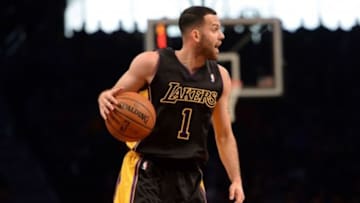 Nov 27, 2013; Brooklyn, NY, USA; Los Angeles Lakers point guard Jordan Farmar (1) dribbles against the Brooklyn Nets at Barclays Center. The Lakers won 99-94. Mandatory Credit: Joe Camporeale-USA TODAY Sports