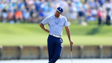 PONTE VEDRA BEACH, FLORIDA - MARCH 15: Tiger Woods of the United States reacts after a quadruple bogey on the 17th hole during the second round of The PLAYERS Championship on The Stadium Course at TPC Sawgrass on March 15, 2019 in Ponte Vedra Beach, Florida. (Photo by Sam Greenwood/Getty Images)