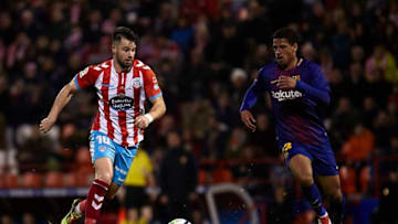 LUGO, SPAIN - FEBRUARY 18: Antonio Campillo of CD Lugo is challenged by Marcus McGuane of FC Barcelona B during the La Liga 123 match between CD Lugo and FC Barcelona B at Angel Carro Stadium on February 18, 2018 in Lugo, Spain. (Photo by Quality Sport Images/Getty Images)