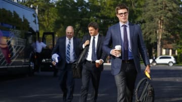 LUCAN, ON - SEPTEMBER 18: General manager Kyle Dubas of the Toronto Maple Leafs makes his way into the arena from the team bus prior to their preseason game against the Ottawa Senators during Kraft Hockeyville Canada at the Lucan Community Memorial Centre on September 18, 2018 in Lucan, Ontario, Canada. (Photo by Mark Blinch/NHLI via Getty Images)