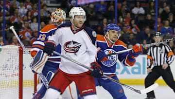 Feb 2, 2016; Edmonton, Alberta, CAN; Columbus Blue Jackets forward Scott Hartnell (43) battles with Edmonton Oilers defensemen Andrej Sekera (2) in front of goaltender Cam Talbot (33) during the second period at Rexall Place. Mandatory Credit: Perry Nelson-USA TODAY Sports