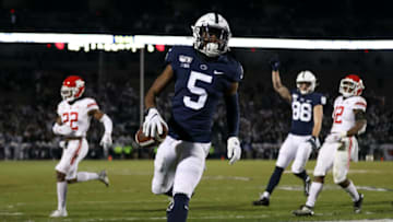 Nov 30, 2019; University Park, PA, USA; Penn State Nittany Lions wide receiver Jahan Dotson (5) runs the ball into the end zone for a touchdown during the fourth quarter against the Rutgers Scarlet Knights at Beaver Stadium. Penn State defeated Rutgers 27-6. Mandatory Credit: Matthew O'Haren-USA TODAY Sports