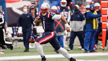 Auburn footballJan 3, 2021; Foxborough, Massachusetts, USA; New England Patriots quarterback Cam Newton (1) runs in the open field against the New York Jets during the first half at Gillette Stadium. Mandatory Credit: Winslow Townson-USA TODAY Sports