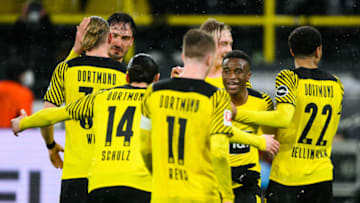 DORTMUND, GERMANY - FEBRUARY 20: Youssoufa Moukoko of Dortmund celebrates after scoring his team's fourth goal with his team during the Bundesliga match between Borussia Dortmund and Borussia Mönchengladbach at Signal Iduna Park on February 20, 2022 in Dortmund, Germany. (Photo by Marvin Ibo Guengoer/GES-Sportfoto via Getty Images)