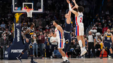 Cade Cunningham #2 of the Detroit Pistons shoots over Nikola Jokic #15 of the Denver Nuggets (Photo by Ethan Mito/Clarkson Creative/Getty Images)
