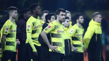 DORTMUND, GERMANY - NOVEMBER 25: Players of Dortmund stand in front of their fans stand dejected after the Bundesliga match between Borussia Dortmund and FC Schalke 04 at Signal Iduna Park on November 25, 2017 in Dortmund, Germany. (Photo by Alex Grimm/Bongarts/Getty Images)