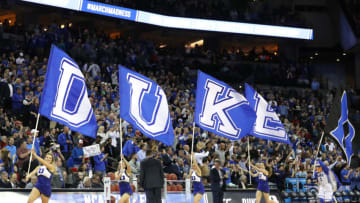 OMAHA, NE - MARCH 25: The Duke Blue Devils cheerleaders carry their schools flags on to the court prior to the 2018 NCAA Men's Basketball Tournament Midwest Regional against the Kansas Jayhawks at CenturyLink Center on March 25, 2018 in Omaha, Nebraska. (Photo by Streeter Lecka/Getty Images)