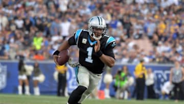 Nov 6, 2016; Los Angeles, CA, USA; Carolina Panthers quarterback Cam Newton (1) carries the ball against the Los Angeles Rams during a NFL football game at Los Angeles Memorial Coliseum. The Panthers defeated the Rams 13-10. Mandatory Credit: Kirby Lee-USA TODAY Sports