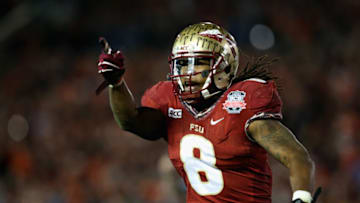 PASADENA, CA - JANUARY 06: Running back Devonta Freeman #8 of the Florida State Seminoles reacts to a play against the Auburn Tigers the 2014 Vizio BCS National Championship Game at the Rose Bowl on January 6, 2014 in Pasadena, California. (Photo by Stephen Dunn/Getty Images)