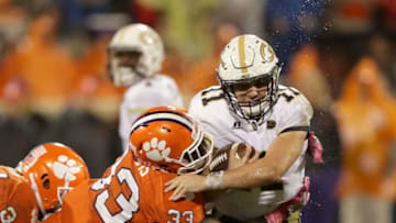 CLEMSON, SC - OCTOBER 28: Matthew Jordan #11 of the Georgia Tech Yellow Jackets is hit by J.D. Davis #33 of the Clemson Tigers during their game at Memorial Stadium on October 28, 2017 in Clemson, South Carolina. (Photo by Streeter Lecka/Getty Images)