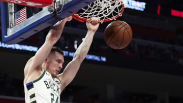 Milwaukee Bucks guard Pat Connaughton (24) dunks in the second half against the Detroit Pistons Credit: Rick Osentoski-USA TODAY Sports