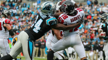 CHARLOTTE, NC - DECEMBER 24: Atlanta Falcons wide receiver Taylor Gabriel (18) makes a catch covered by Carolina Panthers cornerback James Bradberry (24) during the conference matchup between the Carolina Panthers and the Atlanta Falcons on December 24, 2016 at Bank of America Stadium in Charlotte, NC. Falcons win 33-16 over the Panthers. (Photo by Jim Dedmon/Icon Sportswire via Getty Images)