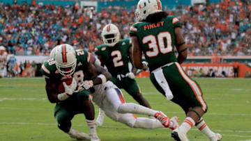 MIAMI GARDENS, FL - OCTOBER 21: Michael Jackson #28 of the Miami Hurricanes cathes an interception during a game against the Syracuse Orange at Sun Life Stadium on October 21, 2017 in Miami Gardens, Florida. (Photo by Mike Ehrmann/Getty Images)