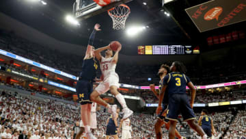 LOUISVILLE, KENTUCKY - DECEMBER 03: Jordan Nwora #33 of the Louisville Cardinals shoots the ball during the 58-43 win against the Michigan Wolverines at KFC YUM! Center on December 03, 2019 in Louisville, Kentucky. (Photo by Andy Lyons/Getty Images)