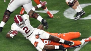 Jan 11, 2016; Glendale, AZ, USA; Alabama Crimson Tide running back Derrick Henry (2) is brought down by Clemson Tigers defensive end Shaq Lawson (90) during the first quarter in the 2016 CFP National Championship at University of Phoenix Stadium. Mandatory Credit: Gary A. Vasquez-USA TODAY Sports