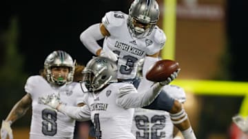 OXFORD, OH - NOVEMBER 15: Kevin McGill #4 of the Eastern Michigan Eagles celebrates with Justin Moody #13 after a interception against the Miami Ohio Redhawks during the second half at Yager Stadium on November 15, 2017 in Oxford, Ohio. (Photo by Michael Reaves/Getty Images)