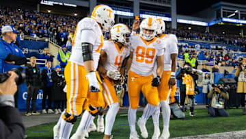 Nov 6, 2021; Lexington, Kentucky, USA; Tennessee Volunteers running back Tiyon Evans (8) and tight end Hunter Salmon (89) celebrate with wide receiver Cedric Tillman (4) after he scored a touchdown during the fourth quarter to put the Tennessee Volunteers ahead 44-35 against the Kentucky Wildcats at Kroger Field. Mandatory Credit: Jordan Prather-USA TODAY Sports