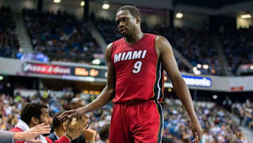 Apr 1, 2016; Sacramento, CA, USA; Miami Heat forward Luol Deng (9) returns to the bench in the game against the Sacramento Kings in the second quarter at Sleep Train Arena. Miami won 112-106. Mandatory Credit: John Hefti-USA TODAY Sports