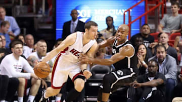 Dec 28, 2015; Miami, FL, USA; Miami Heat guard Goran Dragic (7) is pressured by Brooklyn Nets guard Jarrett Jack (2) during the first half at American Airlines Arena. Mandatory Credit: Steve Mitchell-USA TODAY Sports