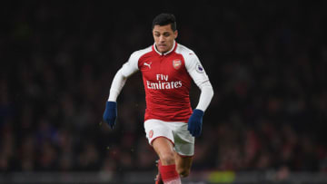 LONDON, ENGLAND - JANUARY 03: Alexis Sanchez of Arsenal runs with ball during the Premier League match between Arsenal and Chelsea at Emirates Stadium on January 3, 2018 in London, England. (Photo by Shaun Botterill/Getty Images)