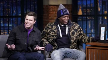 LATE NIGHT WITH SETH MEYERS -- Episode 785 -- Pictured: (l-r) SNL's Colin Jost and Michael Che during an interview with host Seth Meyers on January 21, 2019 -- (Photo by: Lloyd Bishop/NBC/NBCU Photo Bank via Getty Images)
