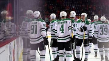 CALGARY, AB - NOVEMBER 28: Dallas Stars Center Tyler Seguin (91) and teammates celebrate their 4-3 overtime win following an NHL game where the Calgary Flames hosted the Dallas Stars on November 28, 2018, at the Scotiabank Saddledome in Calgary, AB. (Photo by Brett Holmes/Icon Sportswire via Getty Images)