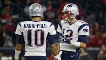 Dec 13, 2015; Houston, TX, USA; New England Patriots quarterback Tom Brady (12) and quarterback Jimmy Garoppolo (10) before the game against the Houston Texans at NRG Stadium. Mandatory Credit: Kevin Jairaj-USA TODAY Sports