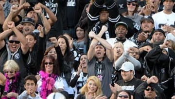 Oct 21, 2012; Oakland, CA, USA; Oakland Raiders defensive tackle Richard Seymour (92) gestures to fans in the fourth quarter against the Jacksonville Jaguars at O.co Coliseum. The Raiders defeated the Jaguars in overtime 26-23. Mandatory Credit: Kirby Lee/Image of Sport-USA TODAY Sports