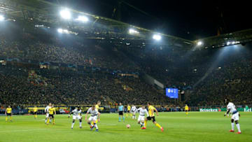 DORTMUND, GERMANY - MARCH 05: A general view as Mario Gotze of Borussia Dortmund takes on Harry Winks of Tottenham Hotspur during the UEFA Champions League Round of 16 Second Leg match between Borussia Dortmund and Tottenham Hotspur at Westfalen Stadium on March 05, 2019 in Dortmund, North Rhine-Westphalia. (Photo by Dean Mouhtaropoulos/Getty Images)