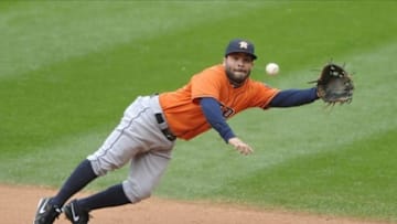 Sep 22, 2013; Cleveland, OH, USA; Houston Astros second baseman Jose Altuve (27) makes a diving catch in the seventh inning agains the Cleveland Indians at Progressive Field. Mandatory Credit: David Richard-USA TODAY Sports