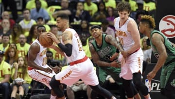 Apr 16, 2016; Atlanta, GA, USA; Atlanta Hawks forward Thabo Sefolosha (25) steals the loose ball away from Boston Celtics guard Isaiah Thomas (4) during the first half in game one of the first round of the NBA Playoffs at Philips Arena. Mandatory Credit: John David Mercer-USA TODAY Sports