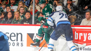 ST. PAUL, MN - APRIL 17: Blake Wheeler #26 of the Winnipeg Jets collides with Nick Seeler #36 of the Minnesota Wild in Game Four of the Western Conference First Round during the 2018 NHL Stanley Cup Playoffs at the Xcel Energy Center on April 17, 2018 in St. Paul, Minnesota. (Photo by Bruce Kluckhohn/NHLI via Getty Images)