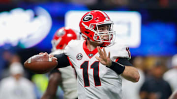 ATLANTA, GA - DECEMBER 02: Georgia Bulldogs quarterback Jake Fromm (11) drops back to pass during the SEC Championship Game between the Georgia Bulldogs and the Auburn Tigers on December 02, 2017 at Mercedes-Benz Stadium in Atlanta, GA. The Georgia Bulldogs won the game 28-7. (Photo by Todd Kirkland/Icon Sportswire via Getty Images)