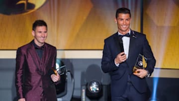 ZURICH, SWITZERLAND - JANUARY 12: FIFA Ballon d'Or nominees Lionel Messi of Argentina and FC Barcelona (L) and Cristiano Ronaldo of Portugal and Real Madrid smile during the FIFA Ballon d'Or Gala 2014 at the Kongresshaus on January 12, 2015 in Zurich, Switzerland. (Photo by Philipp Schmidli/Getty Images)