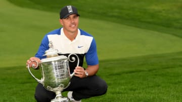FARMINGDALE, NEW YORK - MAY 19: Brooks Koepka of the United States poses with the Wanamaker Trophy during the Trophy Presentation Ceremony after winning the final round of the 2019 PGA Championship at the Bethpage Black course on May 19, 2019 in Farmingdale, New York. (Photo by Ross Kinnaird/Getty Images)