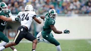 EAST LANSING, MI - OCTOBER 3: LJ Scott #3 of the Michigan State Spartans runs the ball in the first quarter against the Purdue Boilermakers at Spartan Stadium on October 3, 2015 in East Lansing, Michigan. (Photo by Joe Robbins/Getty Images)