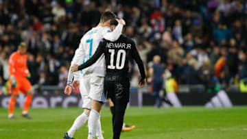 MADRID, SPAIN - FEBRUARY 14: Cristiano Ronaldo of Real Madrid hugs Neymar of Paris Saint-Germain after the UEFA Champions League Round of 16 First Leg match between Real Madrid and Paris Saint-Germain at Bernabeu on February 14, 2018 in Madrid, Spain. (Photo by TF-Images/ Getty Images)