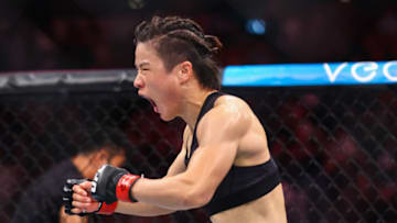 SINGAPORE, SINGAPORE - JUNE 12: Zhang Weili of China reacts after defeating Joanna Jedrzejcyk of Poland during their Women's Strawweight Fight at Singapore Indoor Stadium on June 12, 2022 in Singapore. (Photo by Yong Teck Lim/Getty Images)